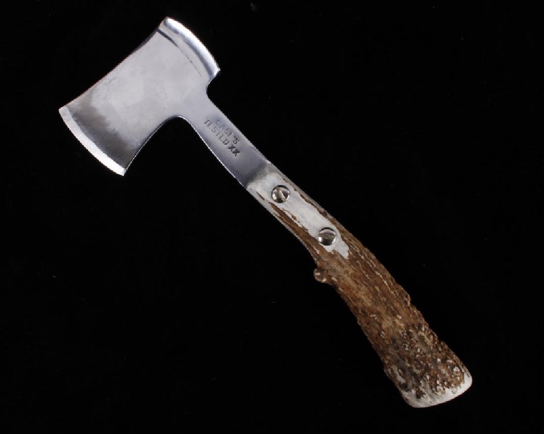 Case Hatchet With Elk Horn Handle Circa 1940s-50s: This lot features a Case tested XX Hatchet with elk horn handle. The blade itself shows little wear and is marked Case's Tested XX. The overall condition is good for its age. Measures: 3 13/16" W x 11