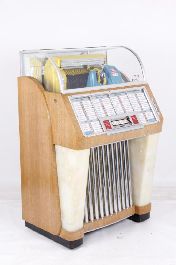 Seeburg Select-O-Matic 100 Jukebox 1952 MINT: This is an excellent near mint all original Seeburg Selct-O-Matic 100 jukebox. The jukebox is a model M100C with serial number of 13717 and was manufactured in 1952. The jukebox plays 45's and feature