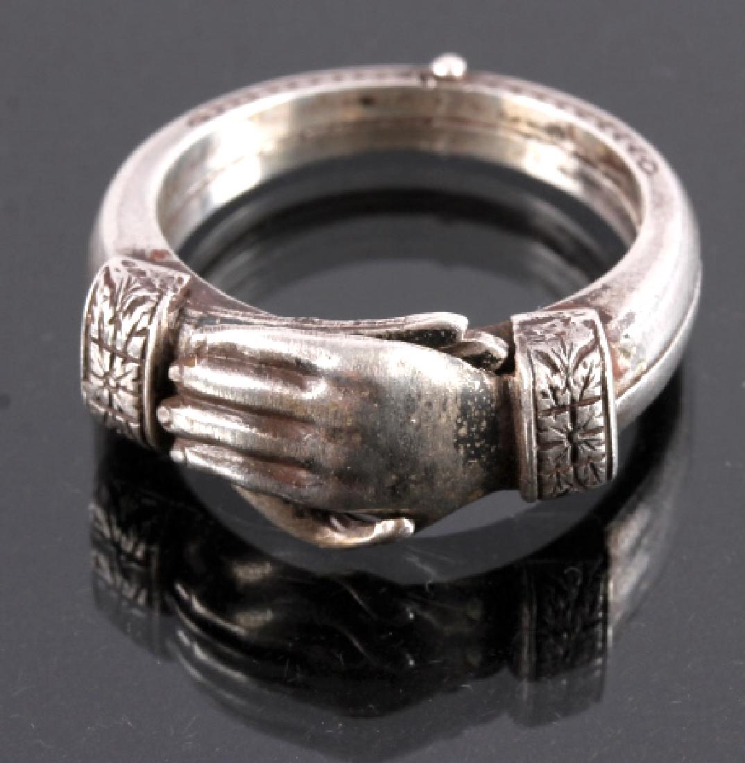 Samuel Kalina Sterling Silver Gimmel Ring: This is a Samuel Kalina sterling silver gimmel ring. The ring is made from two hoops joined together, each one showing a hand with a laurel leaf pattern. The piece is marked "Sterling" and "Pat. 22204