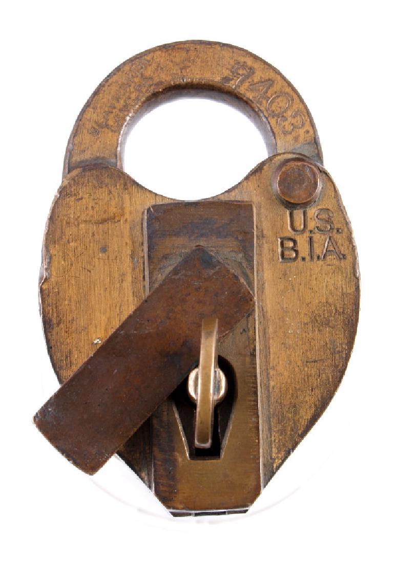 Prohibition Era Bureau of Industrial Alcohol Lock: This is an original lock and key used by the Bureau of Industrial Alcohol. These locks were used by the U.S Government during prohibition to secure warehouses, containers, and shipments of alcohol. A 