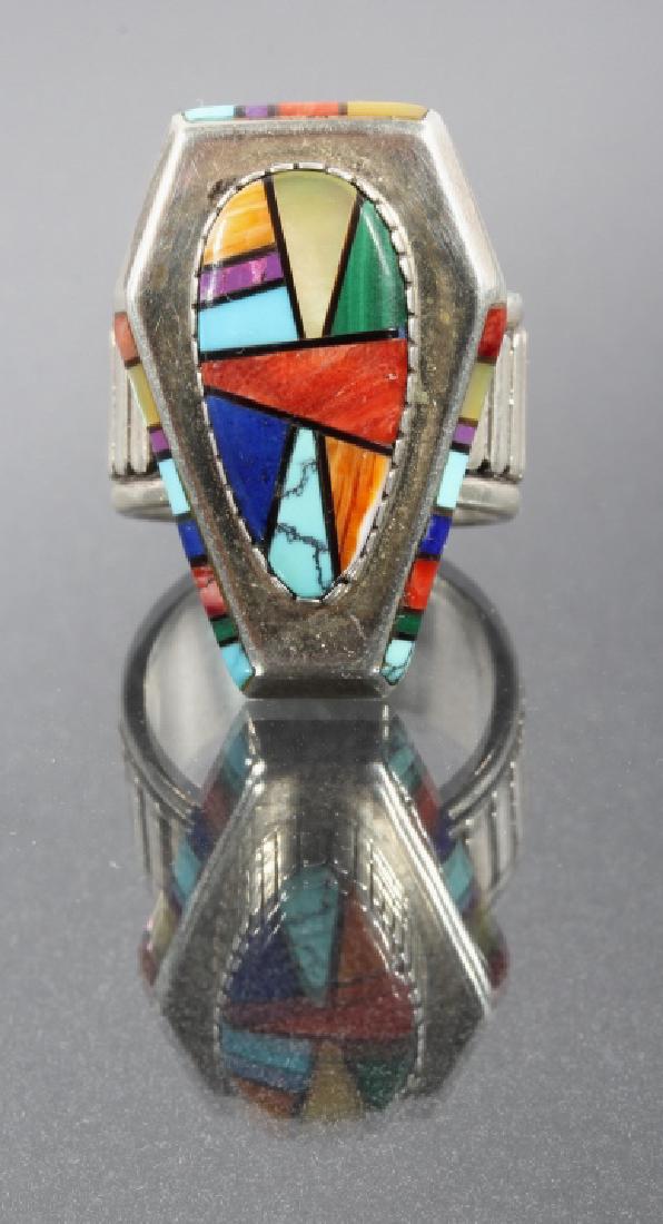 Navajo Inlaid Gem & Sterling Silver Coffin Ring: Offered for sale is a Navajo Native American Indian signed inlaid gem and sterling silver coffin ring. The ring features a inlaid coffin design with mother of pearl, spiny oyster, sugilite, turquoise,
