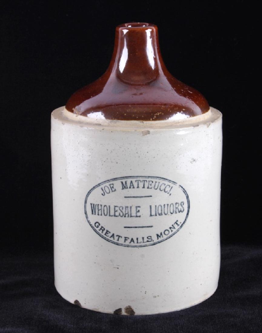 Joe Matteucci Whiskey Jug Great Falls Montana: This is an original Joe Matteucci whiskey crock jug from Great Falls, Montana circa 1890. The jug was made by the Red Wing Stoneware Co. and features the two-tone salt glazed finish. The jug is marked