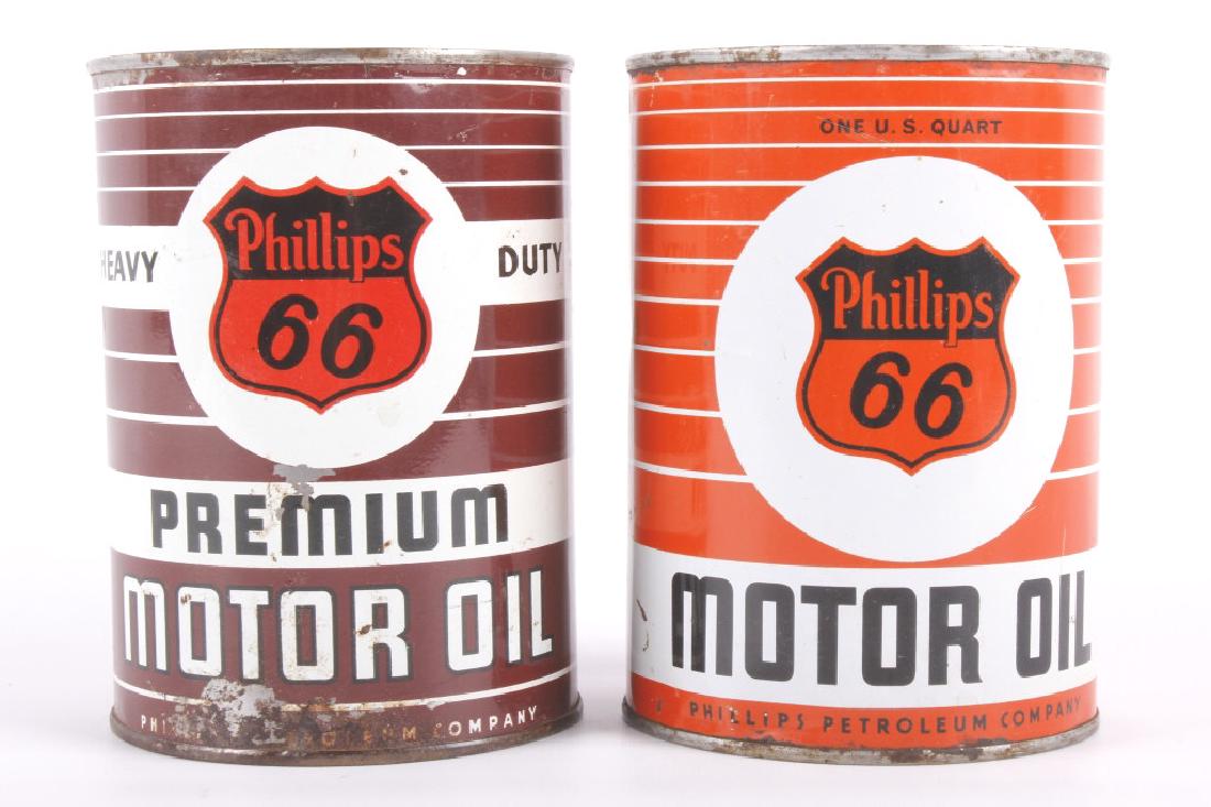 Phillips 66 Motor Oil Cans: Offered for sale on this lot, we have a pair of Phillips 66 motor oil cans. These lithographed tins both show age with minor dents and scattered rust but can still bring plenty of color to your collec