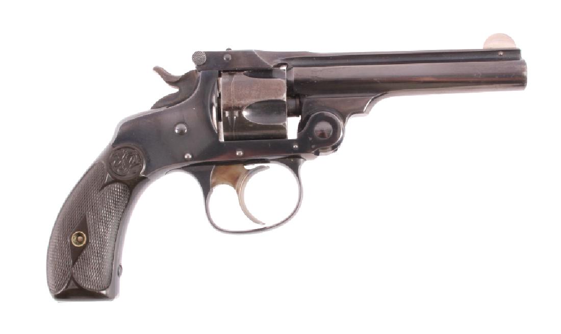 Smith & Wesson .32 Double Action Revolver: This is a Smith & Wesson Fourth Model top-break double action revolver chambered in the .32 caliber. The revolver features a blued steel barrel, frame and 5-shot cylinder with factory Smith & Wesson g