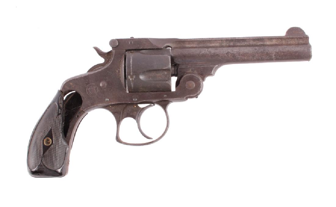 Smith & Wesson .38 Double Action Revolver: This is a Smith & Wesson Fifth Model double action revolver chambered in the .38 caliber. The revolver features a blued steel barrel, frame and 5-shot cylinder with Smith & Wesson checkered grips. The