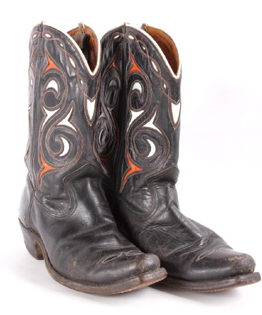 Acme Inlaid Leather Boys Cowboy Boots: Available for bidding in this lot is a pair of ACME cowboy boots, Inlaid with vibrant robin blue, white and red leather. As well, the boots display excellent stitching, that's white and red in color a