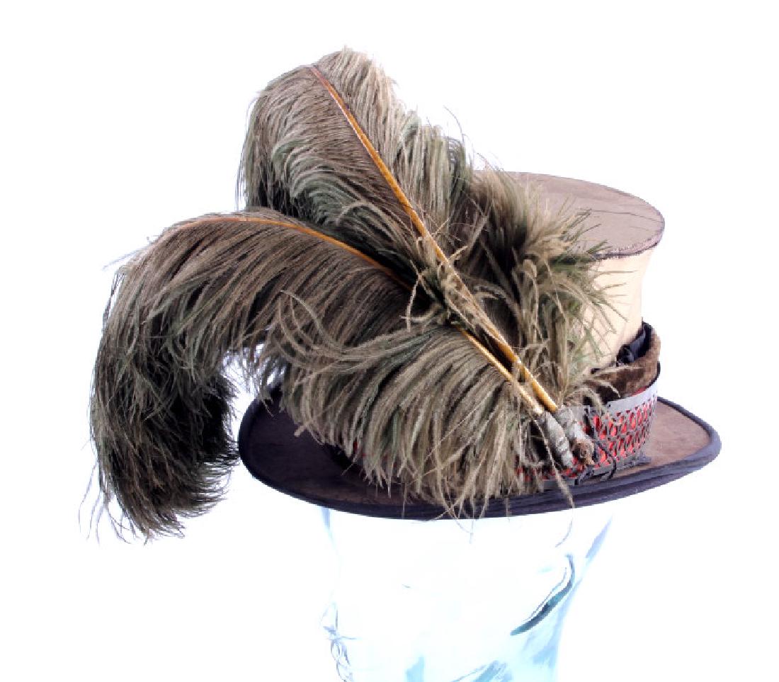 Miccosukee Seminole Egret Plume Top Hat: This is a Miccosukee Seminole Native American Indian Egret plume Stetson top hat. The hat is marked on the inside "Stetson / John B. Stetson Company Philadelphia". The hat band is believed to be made 