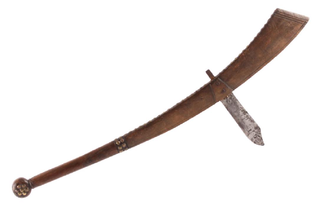 Sioux Knife Blade Gunstock War Club c. 1870-1880: This is an excellent original Sioux Native American Indian gunstock war club showing a "knife blade" weapon end and dating to circa 1870-1880. The war club has been documented and photographed in two 