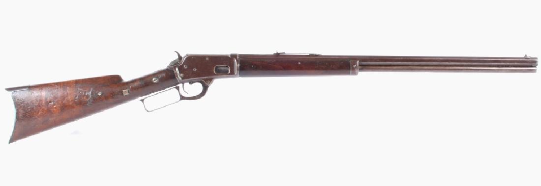 Marlin Model 1888 Top-Eject Octagon .32-20 Rifle: This lot features a Extremely Rare Marlin Model 1888 Top-Eject Octagon Barrel .32-20 Caliber Rifle. The rifle features 24" octagon barrel, top ejects, full length magazine, and deluxe wood. Marlin Mod