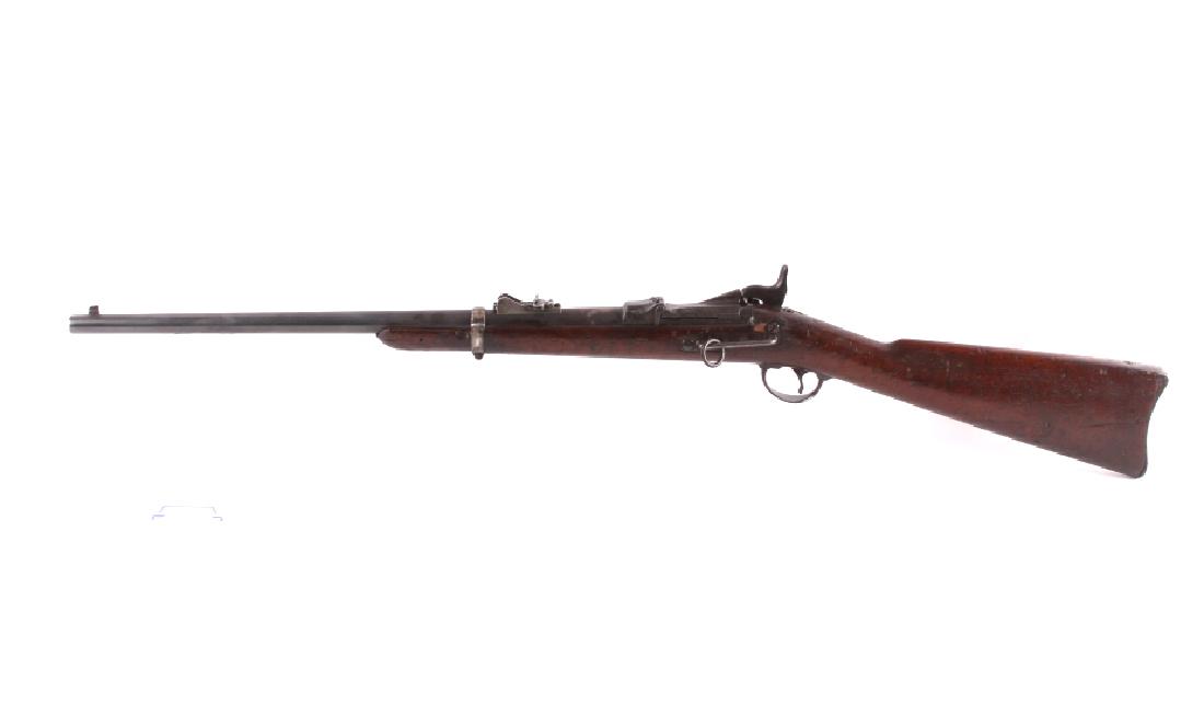 Wounded Knee Massacre Springfield 1873 Carbine: The lot features a wonderfully historic and important Springfield Model 1873 Trapdoor Saddle Ring Carbine from the Battle of Wounded Knee circa 1890. The carbine shows the correct 22 inch round barrel