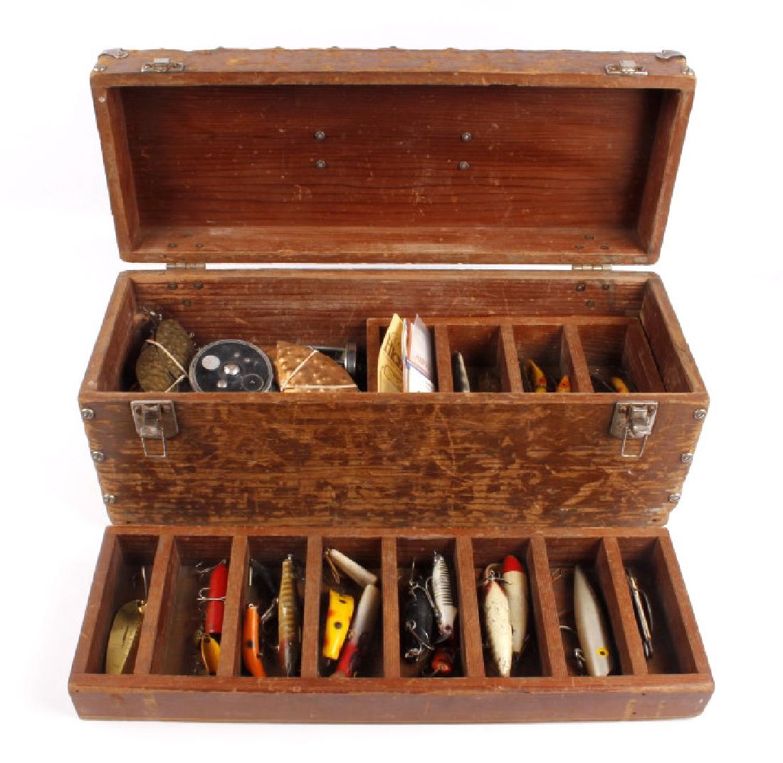 Antique Wooden Loaded Tackle Box: Available for your consideration in this lot is an early wooden Tackle Box loaded with 25+ hooks and lures, two fly boxes, tool kit, three fly reels, two spin reels, Bob Bet bait box, and other variou