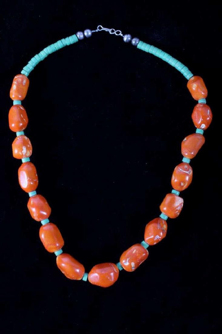 Navajo Hubbell Bamboo Coral Nugget Necklace: Offered for sale is a Navajo Native American Indian Hubbell Trading Post Bamboo Coral Nugget Necklace. The necklace features a group of fifteen Bamboo Coral polished nuggets and green trade beads. The