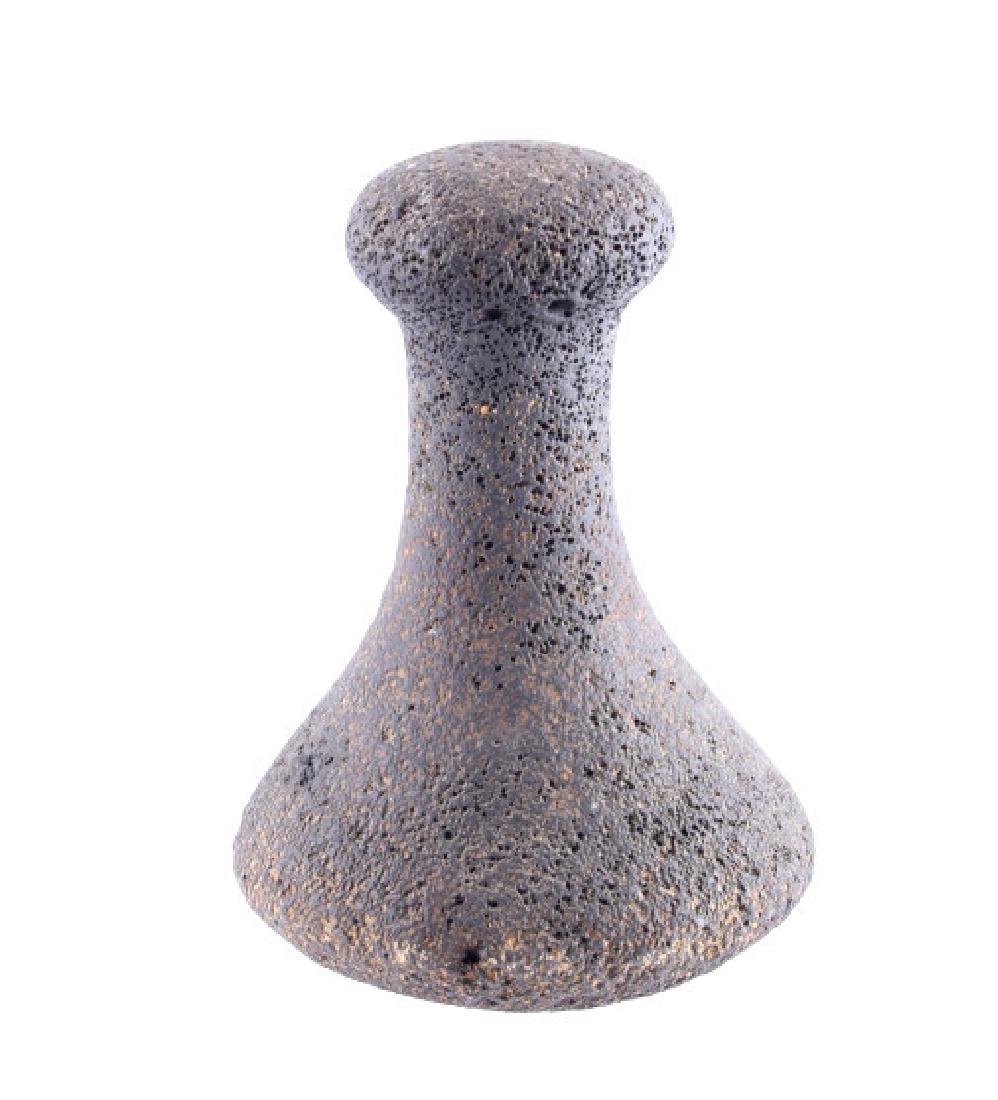Ancient Hawaiian Poi Pounder Artifact: This is an ancient Hawaiian poi pounder artifact. The artifact is made from solid volcanic rock and was used to poi, a Polynesian staple food made from the taro plant. The poi pounder shows good condi