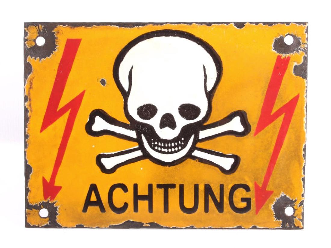 German Achtung Skull Crossed Bones Sign (Nazi): This is a porcelain enamel "Achtung" (meaning warning in German) sign showing a yellow/orange background with white and black skull and crossed bones with excellent red lighting bolts. The sign is bel
