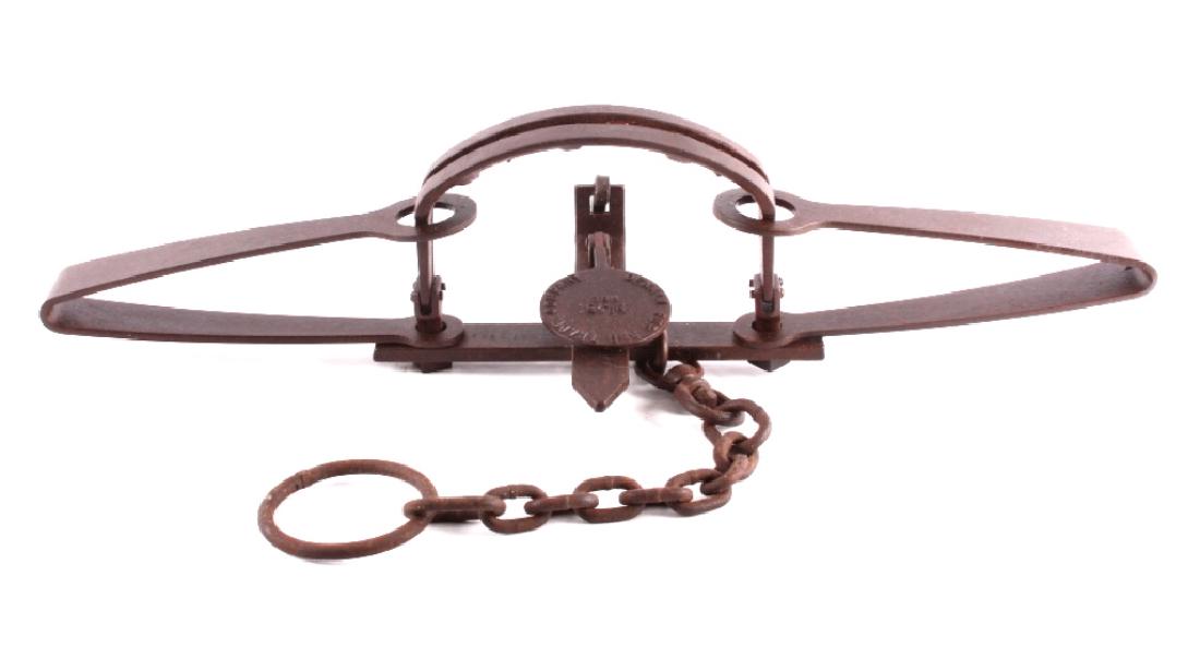 Denali Fur & Trade Company No. 15 HBC Bear Trap: This is a Denali Fur and Trade Company No. 15 bear trap. The pan on the trap is marked "Denali Fur and Trade Company No. 15 HBC". The trap features large toothed jaws and a double spring composition. 
