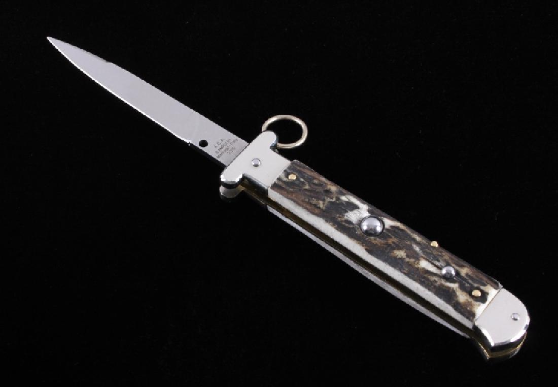 Campolin Ring Pull Stag Switchblade Knife: This is an Italian made ring pull switchblade stiletto knife made by A.G.A. Campolin in Maniago, Itlay. The knife shows very high quality materials and craftsmanship and features beautiful stag antler