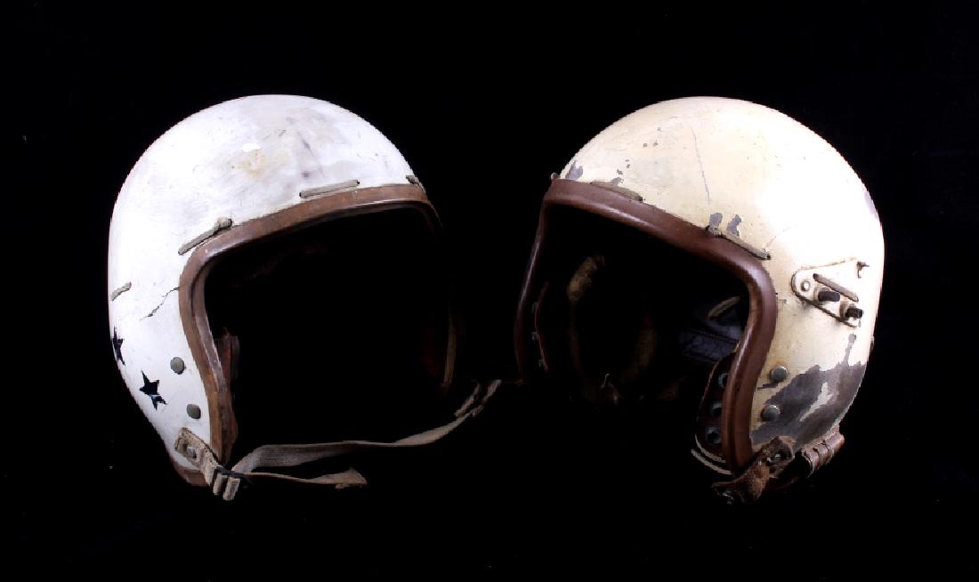 Korean War Era USAF Pilots Helmets: You are bidding on a pair of Korean War era USAF flight helmets. While the helmets look virtually identical, they actually represent a small evolution in USAF helmets. The white helmet with the blue s