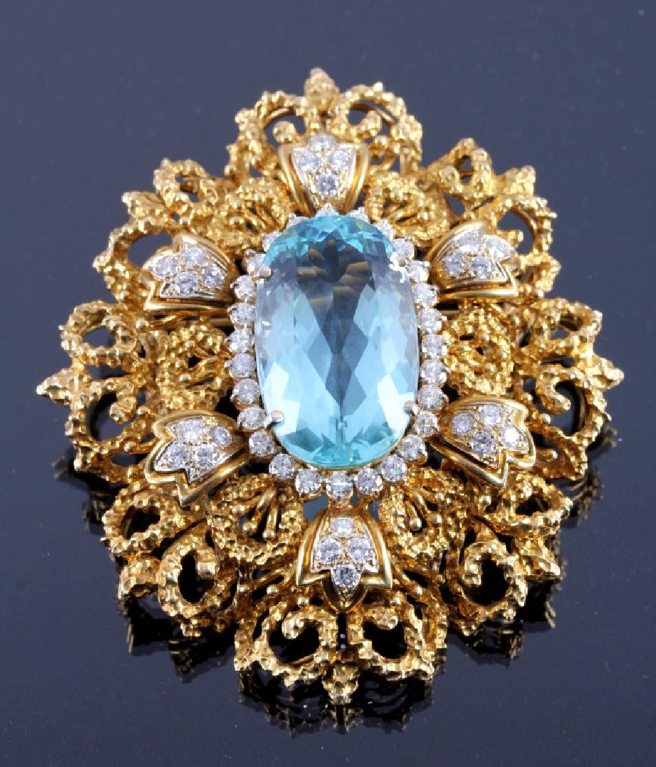 18K Gold Diamond Aquamarine Brooch: This is an 18K yellow gold with diamond and aquamarine gemstone brooch designed and made by a master goldsmith in Chicago, Ill. The brooch is made from solid 18K gold and is set with a large 28 carat 