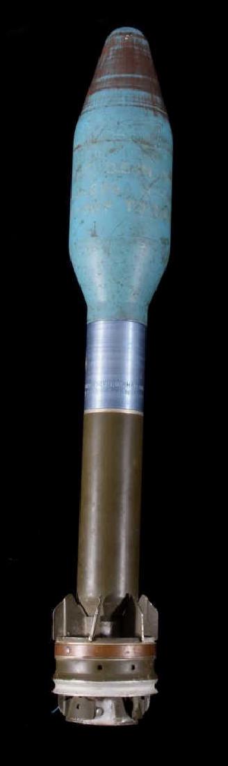 M20 Super Bazooka M29A2 Inert Practice Shell: This lot features a M20 Super Bazooka M29A2 Inert Practice Shell. The shell features a colored exterior, inert warhead, and tail fins. The head of this practice rocket is similar in external contour t