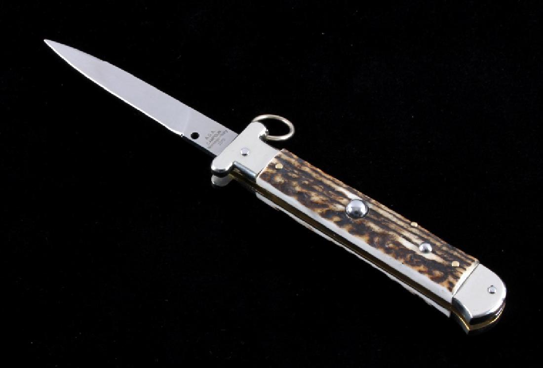 Campolin Ring Pull Stag Switchblade Knife: This is an Italian made ring pull switchblade stiletto knife made by A.G.A. Campolin in Maniago, Itlay. The knife shows very high quality materials and craftsmanship and features beautiful stag antler