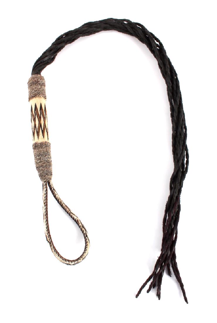 Deer Lodge Montana Prison Horsehair Quirt: This is a Deer Lodge Prison made horsehair quirt from Montana. The piece is hand hitched showing a wonderful repeating diamond pattern around the handle and hand loop. The popper is composed of severa