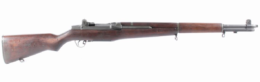 Korean War IHC M1 Garand .30-06 SPRG Rifle 1952-53: This lot features a Korean War International Harvester M1 Garand .30-06 SPRG Rifle. The rifle features a 24" barrel, walnut stock, adjustable peep sights, internal 8 round magazine, and rotating bolt.
