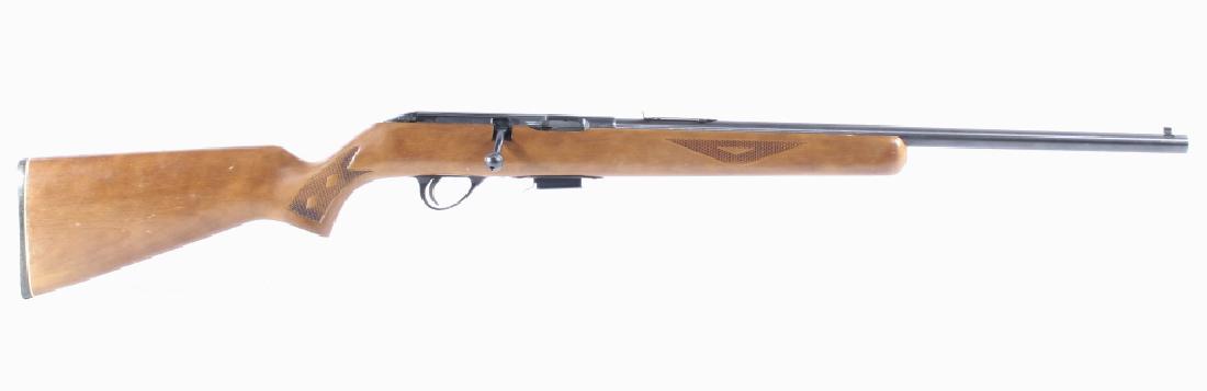 Sears & Roebucks Model 101.52772 .22 Mag. Rifle: This lot features a Sears & Roebuck Model 101.52772 .22 Magnum Rifle. This rifle features a 20" barrel, one 5 round magazine, adjustable sight, hardwood stock, and blue'd finish. This rifle is a Sear 