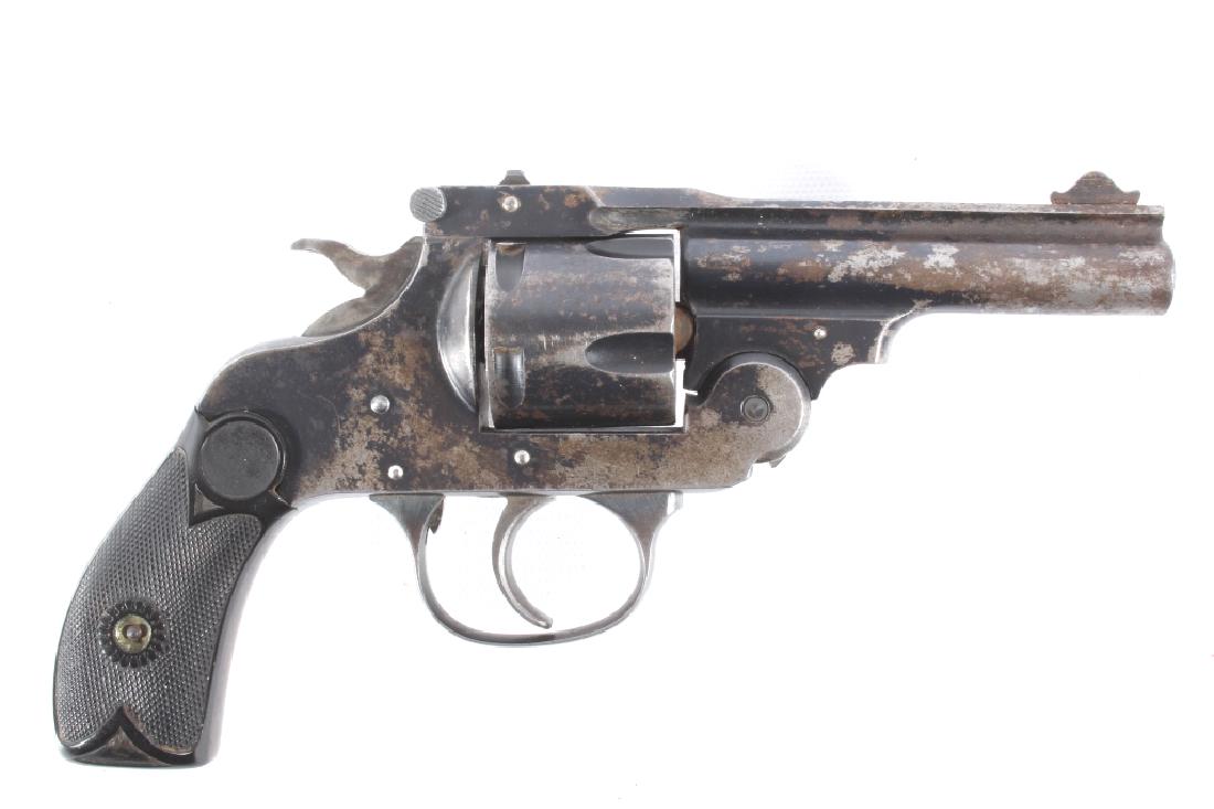 H&R Secret Service Special .38 S&W Revolver: This lot features a Harrington & Richardson Secret Service Special .38 Smith and Wesson Revolver. The revolver features a 2 1/4" barrel, 5 shot cylinder, hard rubber grips, top break action, and blue'