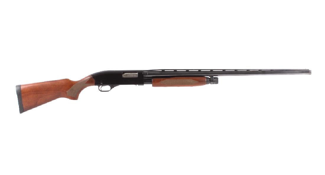 Winchester Model 1300 12Ga. Pump Action Shotgun: This is a Winchester Model 1300 pump action shotgun chambered in the 12 gauge 2 3/4" and 3" shells. The shotgun has a blued steel round 28" barrel with vent rib with a blued receiver and solid walnut 