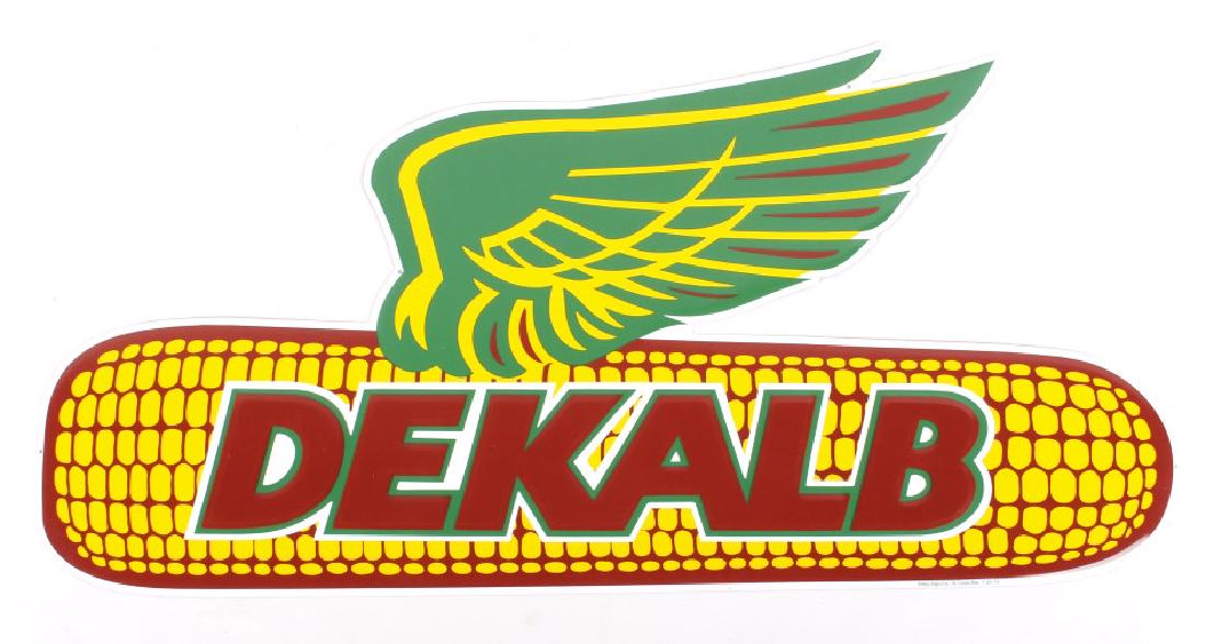 Dekalb Seed Flying Corn Cob Tin Advertising Sign: This lot offers you an embossed tin Dekalb Agricultural Association signs. The sign shows the signature Dekalb winged corn logo. Dekalb Genetics Corporation was founded in 1912, and is still in busine