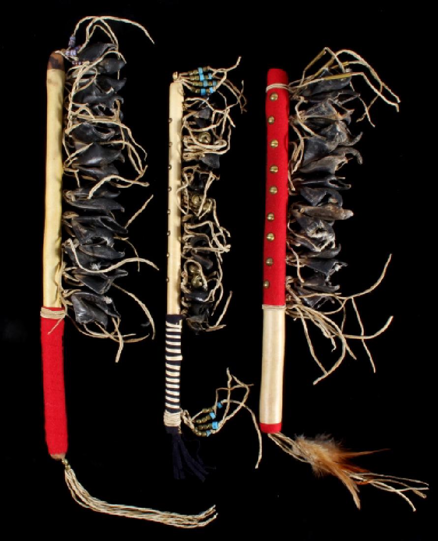 Native American Dew Claw Dance Rattles: This is a collection of three Native American ceremonial dew claw rattles. Each of the rattles features deer dew claws and is adorned with beads, cloth, animal fur, and leather fringes. Deer hoof ratt