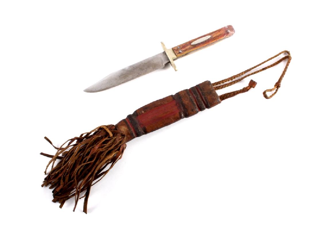 Joseph Rodgers & Sons Boot Knife w/ Scabbard: This is a Joseph Rodgers & Sons boot knife and carved leather scabbard. The knife has a hardened steel blade marked "J. Rodgers & Sons 5 Norfolk St. Sheffield, England". The scabbard is made from leat
