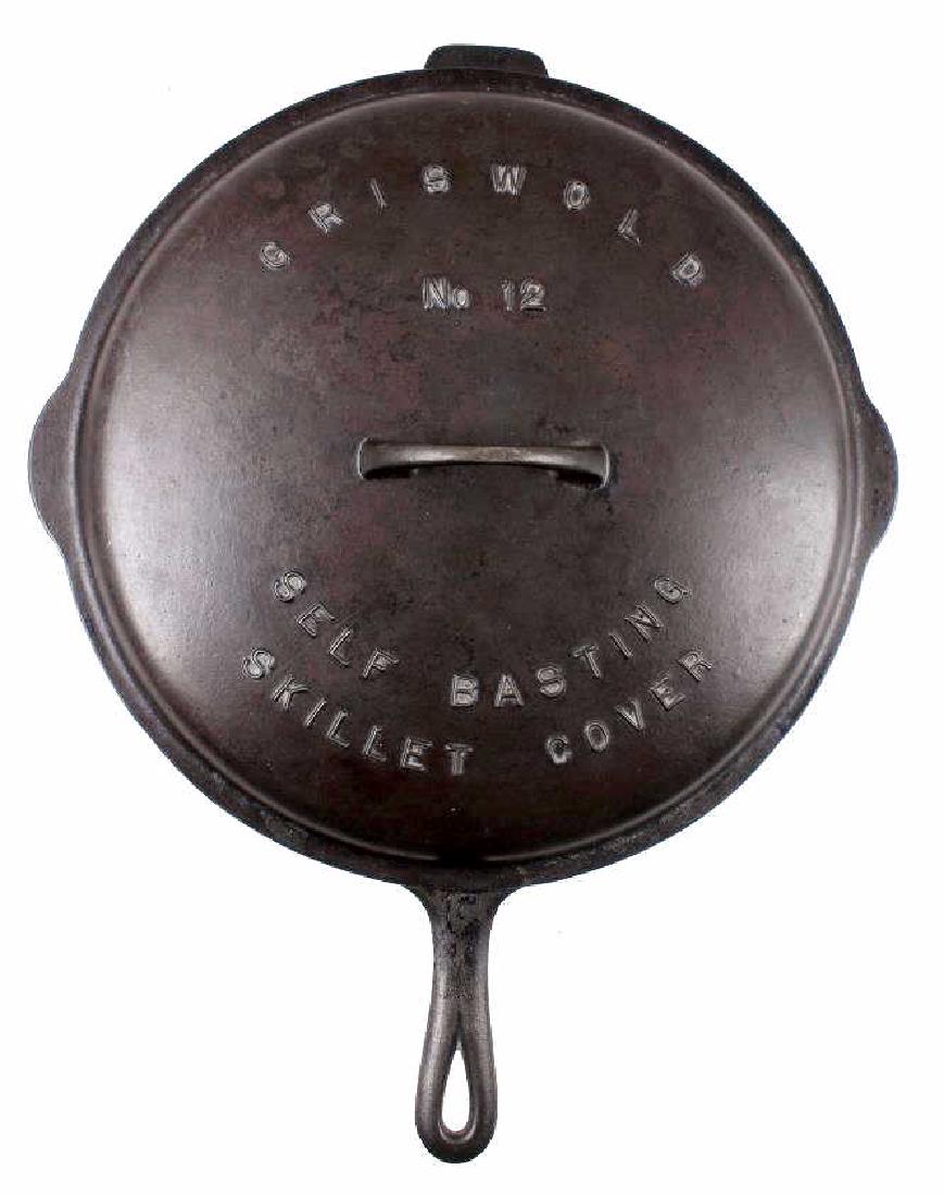 Griswold No. 12 Self Basting Skillet With Cover: Offered for your consideration is this Griswold cast iron large No. 12 skillet with No. 12 "Self Basting Skillet Cover". The skillet and the cover are in very good shape, with no cracks and a smooth c