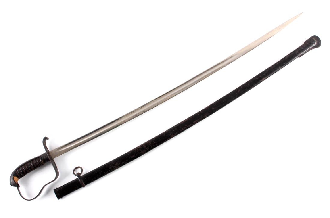 Antique German Cavalry Sword and Scabbard: This is an antique German cavalry sword and scabbard. The sword features a stainless blade etched on both side showing a coat of arms and oak leaf clusters and reads "In Treue Fest". The ricasso is ma