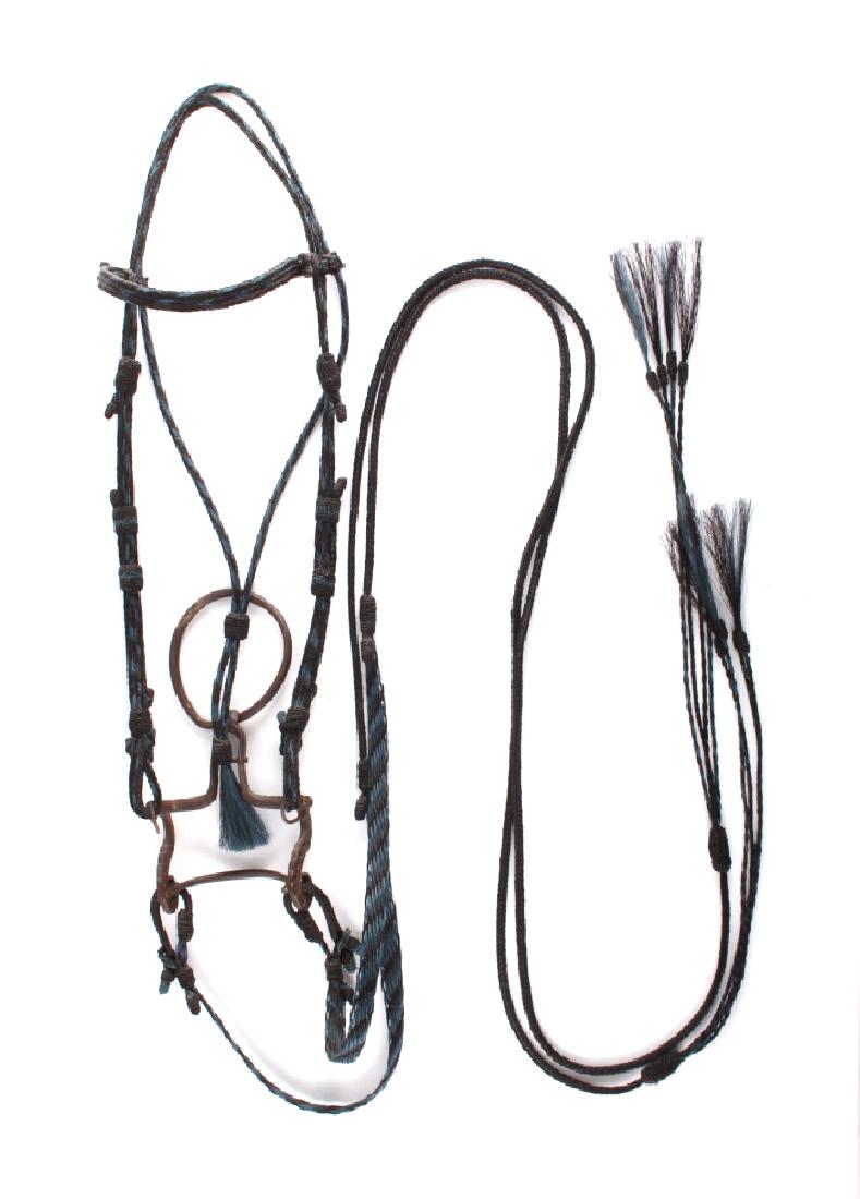 Canyon City Colorado Prison Horsehair Headstall: This is a braided and hitched horsehair headstall with reins made at the Canyon City Prison in Colorado in the 1940's. The piece has a forged iron bit with a braided horsehair headstall and hitched ho