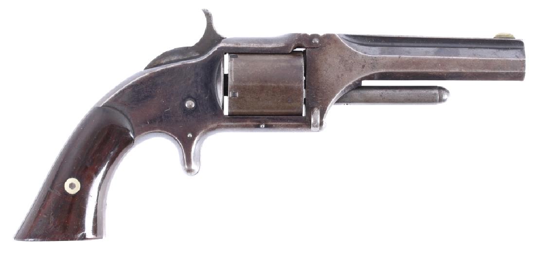 Smith & Wesson Model 1 1/2 1st Issue 32RF Revolver: Offered to you in this lot for bidding is a circa 1866 Smith & Wesson First Issue "Old Model" 1 1/2, blue'd five-shot revolver, chambered in .32 Rim Fire. To reload the weapon, the barrel was tipped u