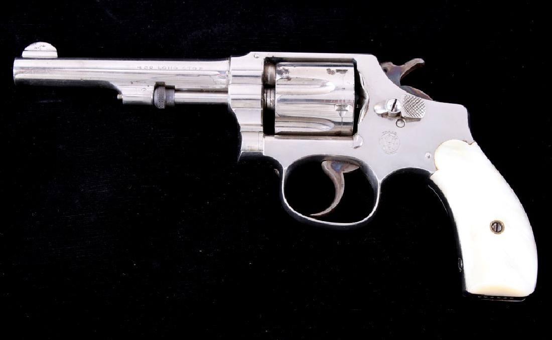 Smith & Wesson 1903 32 Hand Ejector Revolver 90%: This is a wonderfully rare original Smith & Wesson Model of 1903 Hand Ejector 5th Change revolver with a 4 1/4 inch round barrel and chambered in .32 S&W Long caliber. The revolver shows the original