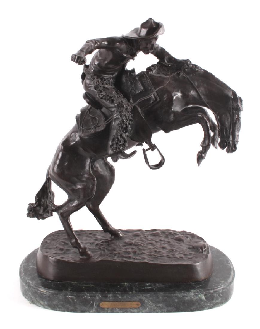 Frederic Remington Bronze "Wooly Chaps": For bidding in this lot is a Frederic Remington sculpture, titled; "Wooly Chaps". Frederic Remington is hands-down the most recognizable Western artist in history. The sculpture shows excellent detail