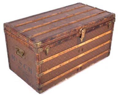 Louis Vuitton Monogram Steamer Trunk c.19th-20thC: Included in this lot for sale is a turn of the century Louis Vuitton steamer trunk. The luggage shows the iconic "LV" monogram canvas, and utilizes exceptional brass hardware. The trunk is labeled and