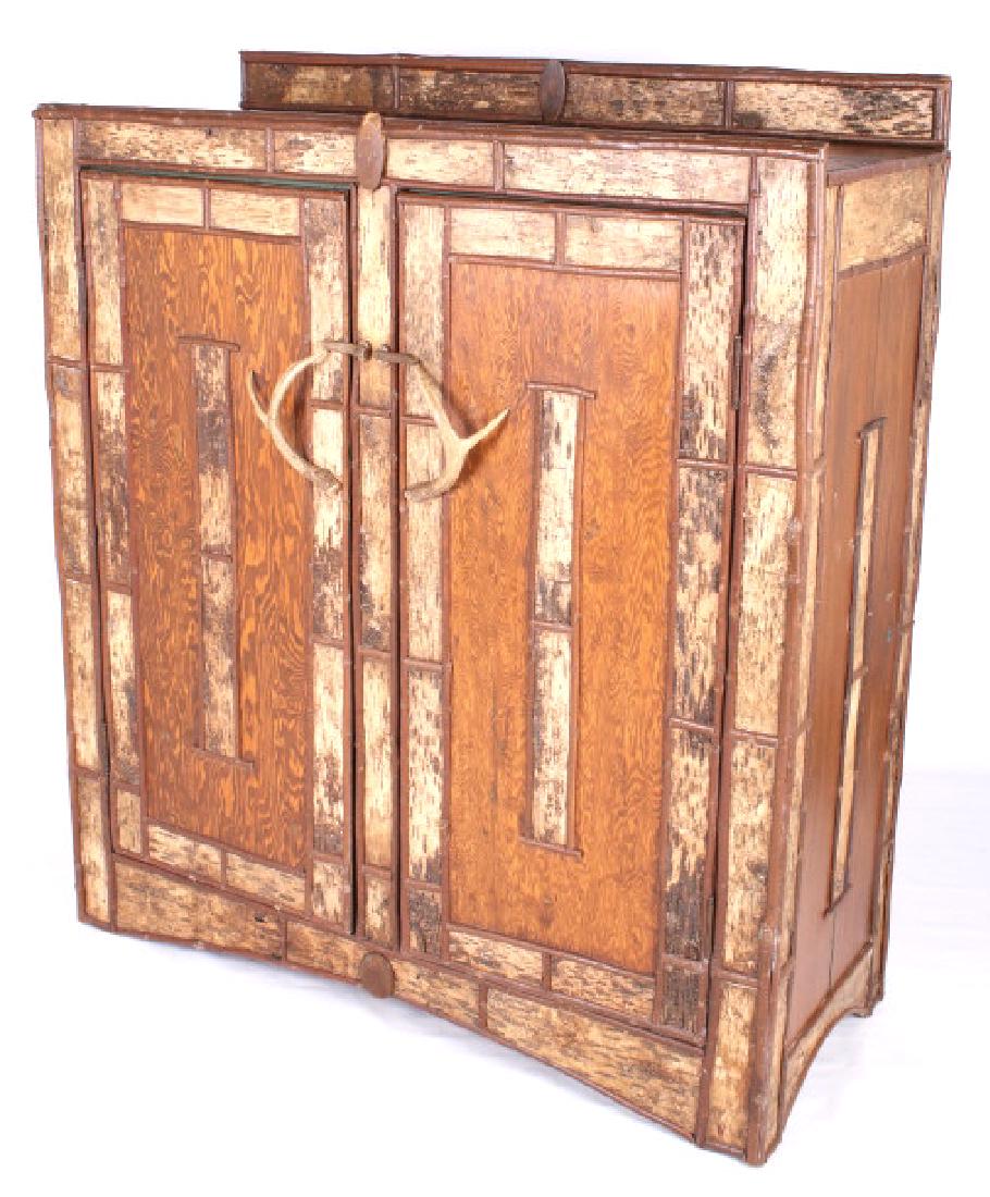 Early Rare Rustic Fir & Antler Armoir Restored: Offered in this lot for your consideration is a custom armoire, crafted of dark stained fir veneer, and live edge pine trim. The sides, and doors of the cabinet have beautiful frame work, with live ed