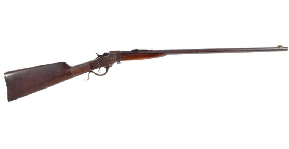 J. Stevens Favorite Model 1915 .22LR Rifle: The lot features a J. Stevens Arms Company Favorite Trade Mark Model 1915 falling block or pivoting block single shot rifle chambered in the desirable varmit and target caliber of .22 long rifle (22LR