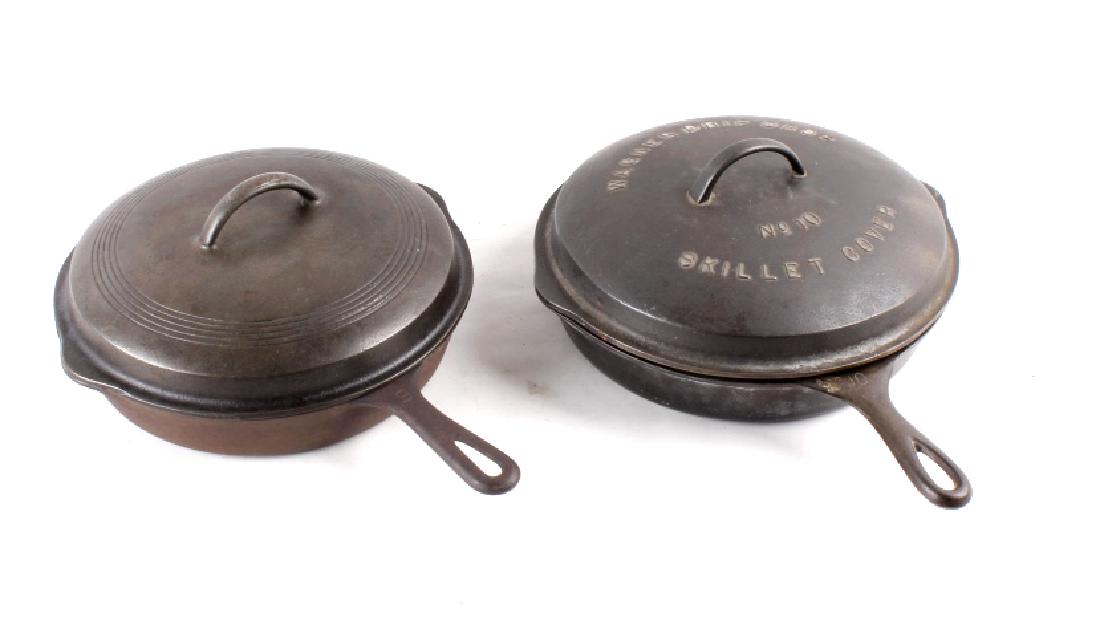 Pair of Wagner & Griswold Skillets with Lids: included in this lot we have a pair of cast iron Wagner & Griswold Skillet with matching lids. The first skillet is a cast iron Wagner number 10 skillet with a matching cast iron drip drop lid. Its ma