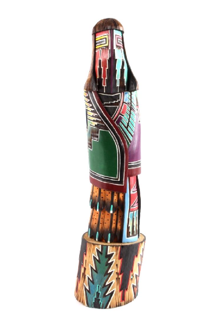 Navajo Native American Carved Wooden Kachina: This is an excellent Navajo Native American Indian carved wooden kachina made by Brian Smith titled "Long Hair Kachina". The artist is a member of the Red Running into Water people of the Navajo. The 