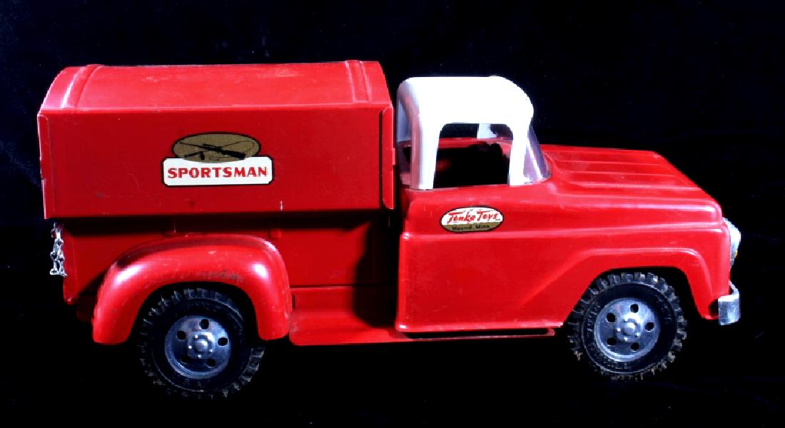 1958 Tonka Sportsman Pick Up: For bidding is a 1958 Tonka Sportsmen pick up truck. This stamped steel pick comes with red topper, plastic front windshield and sportsman decals features a rifle and fishing pole. Tonka Toys decal si
