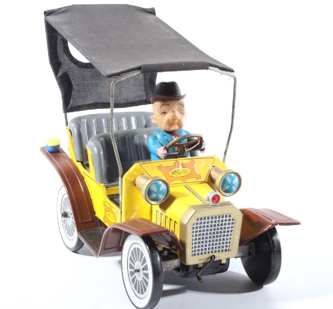 1961 Mr. Magoo Tin Windup Toy by Hadley: For bidding is a vintage battery operated made in Japan Mr. Magoo tin wind up toy. This toy is in amazing shape for its age. No chips or dents in the fenders. There is some slight paint wear that is t