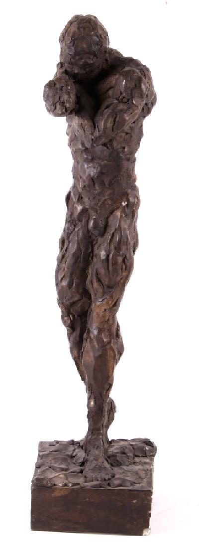 Unique Bronze-Colored Male Figure Nude Sculpture: Featured in this lot is a unique bronze colored male figure nude sculpture. The piece is constructed from a plaster mixture but similar in look and feel to bronze. This unique piece of art depicts a n