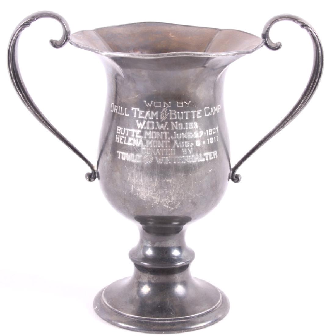Drill Team of Butte Camp Silver Plate Trophy c1911: This lot provides you with a silver plated trophy, awarded to the Drill Team of Butte Camp, and donated by the Towle & Winterhalter Jewelers. The trophy was crafted by Derby Silver Company, and is ser