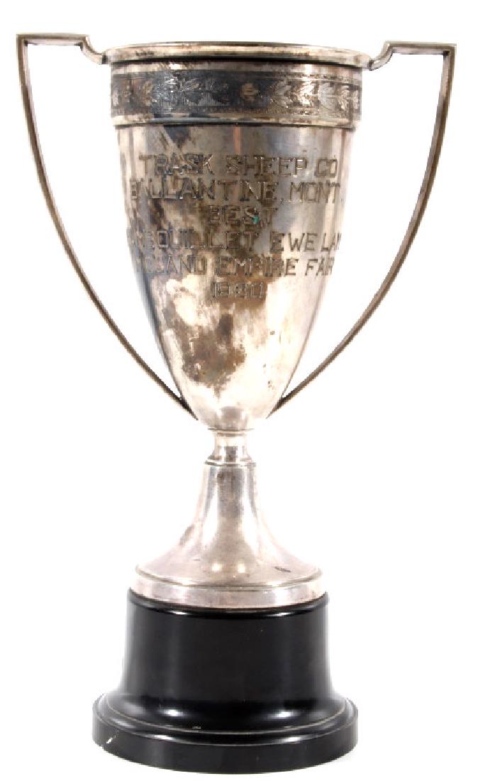 1930 Montana Fair/ Trask Sheep Co. Trophy: For your consideration is this unique piece of Montana Americana: a state fair trophy from 1930. This electroplate silver trophy sits on a hollow black base. The top of the trophy is decorated with an