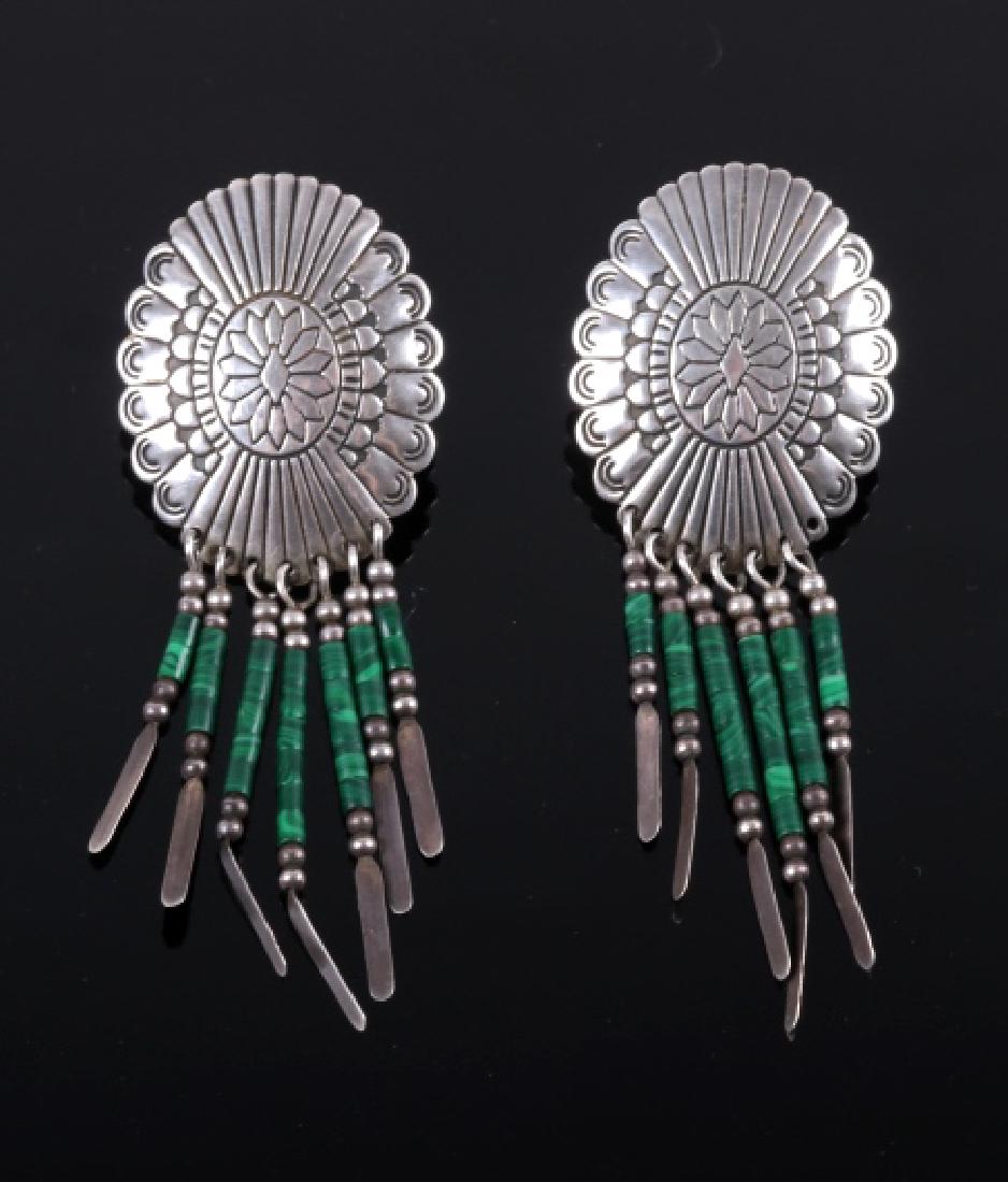 Navajo Sterling Concho & Malachite Dangle Earrings: You are bidding on a gorgeous pair of Navajo sterling concho and malachite dangle earrings. Each earring features a stunning Navajo floral design sterling concho, as well as seven dangles with malachi