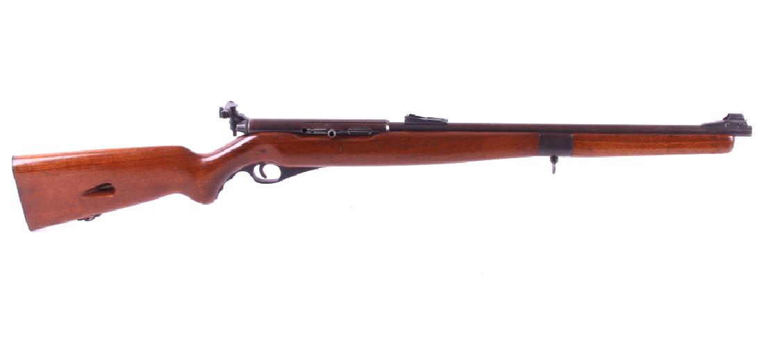Mossberg Model 151M (a) .22 LR Semi-Auto Rifle: For your consideration is a Mossberg model 151M (a) .22 LR semi-auto rifle. This semi-auto .22 long rifle rifle features a full length straight grain walnut hardwood stock and is internally tube fed f